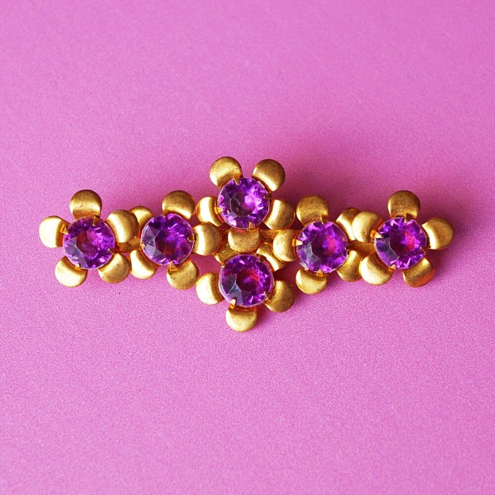Vintage 1940s Gold Tone Flower Brooch with Purple Rhinestones